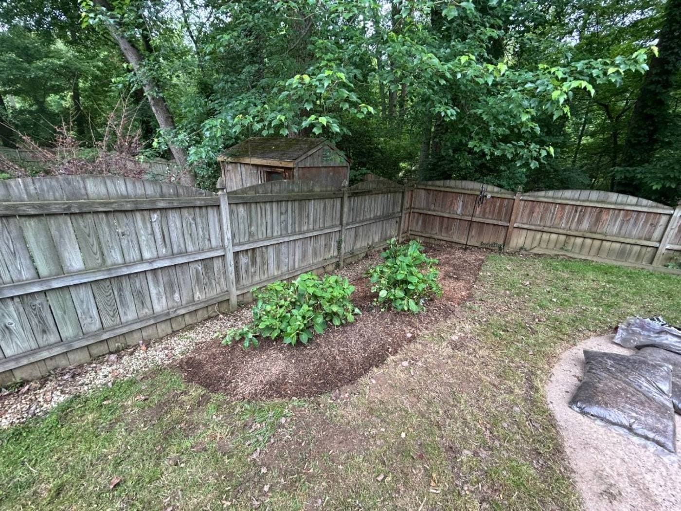 Garden bed after mulching and lawn care in Northern Virginia